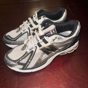 On Trend - New Balance Black and Gold Athletic Sneakers